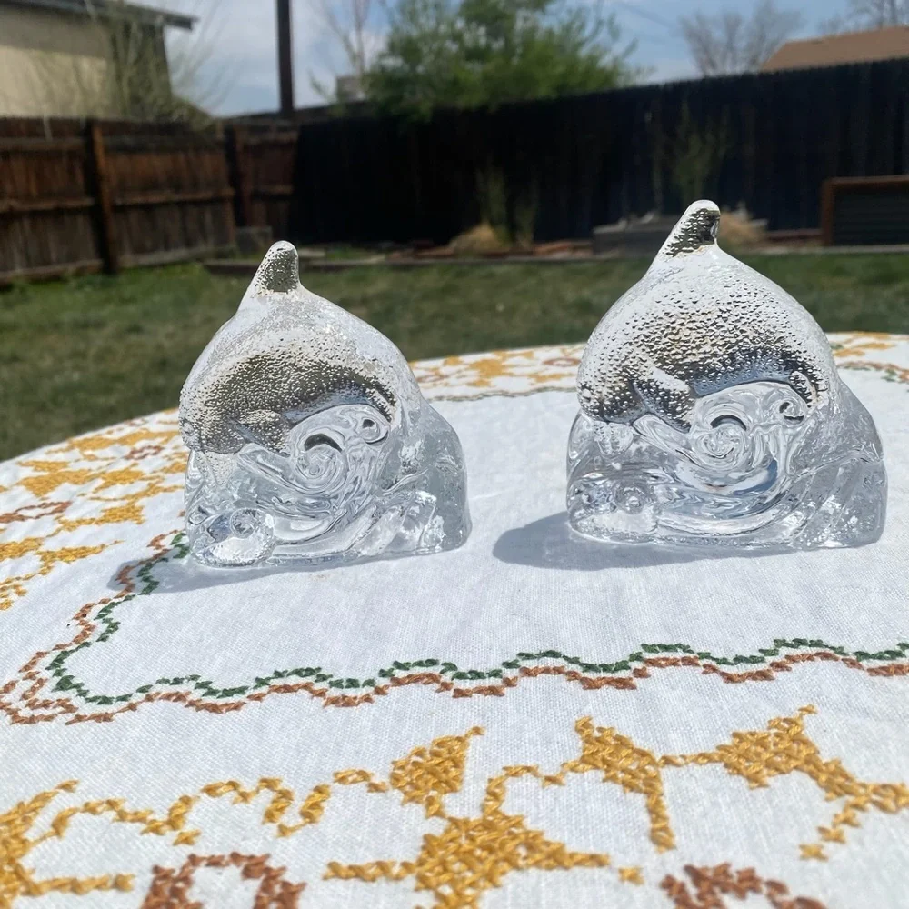 Glass dolphin and wave tea light candle holder